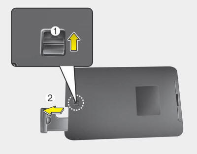 Push and hold the release lever (1) and remove the mechanical key (2). Insert