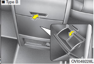 To open the console storage, push the open button. After using the console storage,